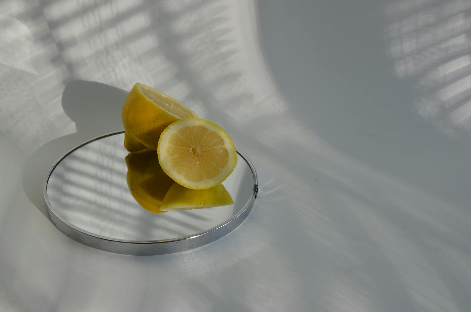 Close-up of a hand holding an orange vibrator, symbolizing modern solo intimacy and self-pleasure.